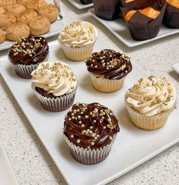 Chocolate and vanilla cupcakes with gold sprinkles from Lilac Pâtisserie