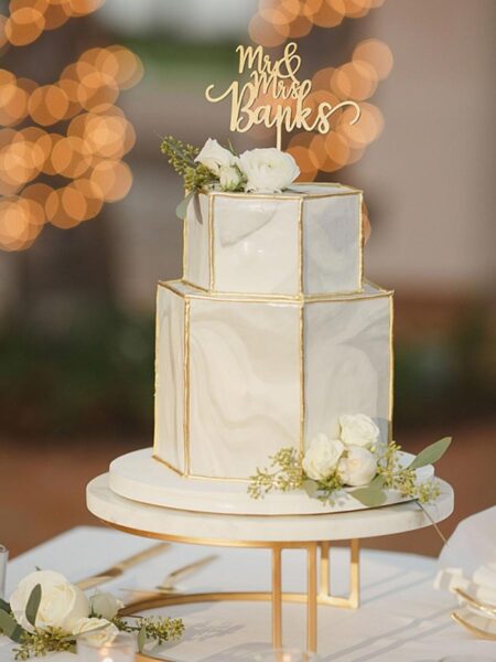 Marbled Hexagon Wedding Cake With Gold Trim